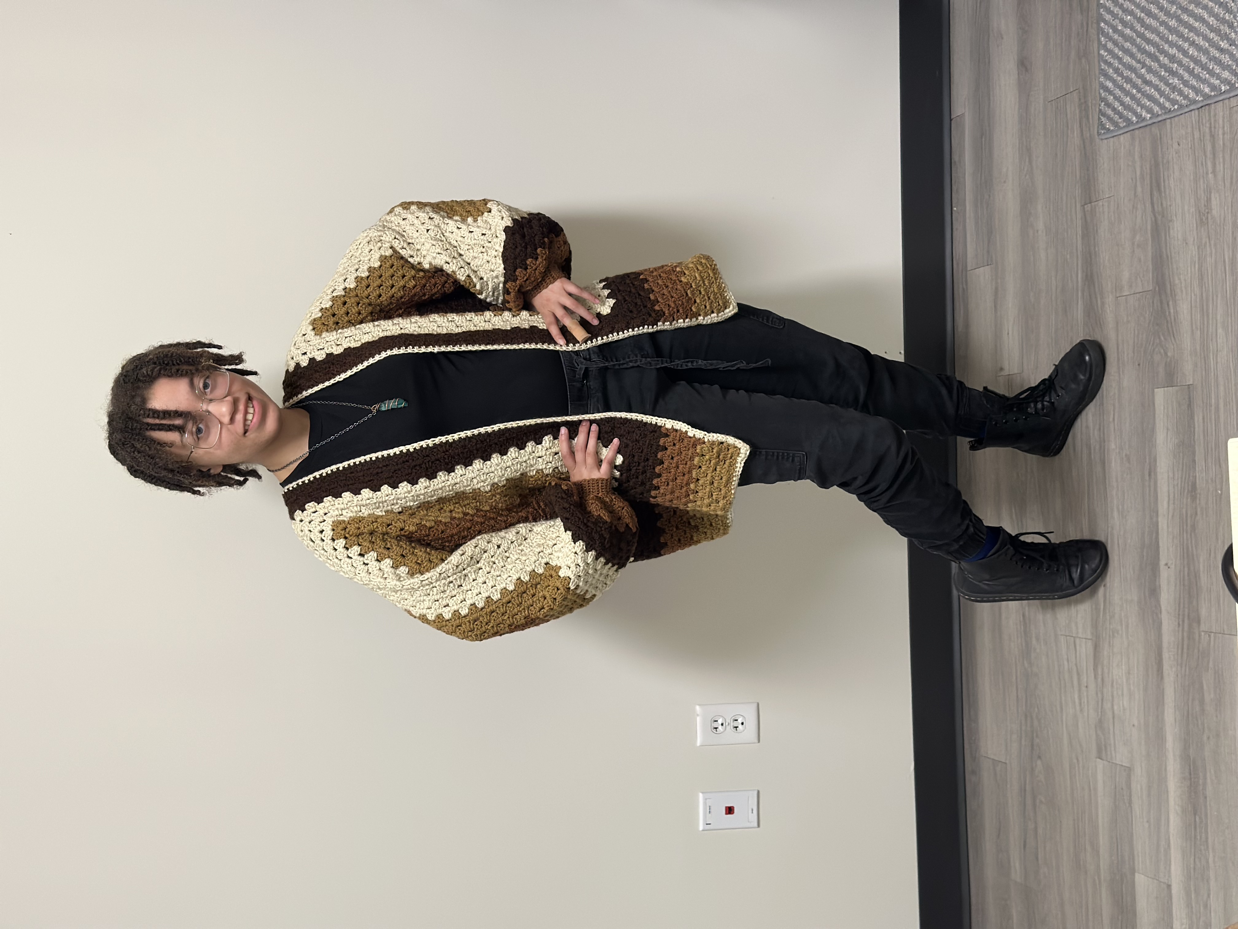 Two models wearing women's black cotton crewneck tee and off-white cotton crewneck tee.